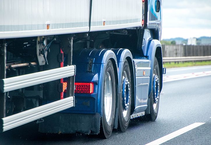 Articulated lorry wheels motorway shutterstock_1805049889