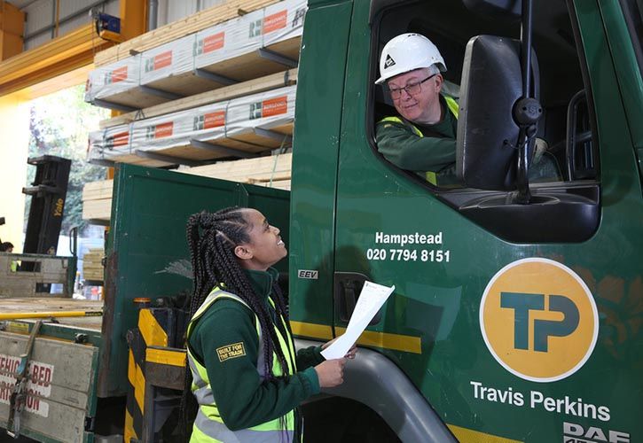 Travis Perkins male and female employees lorry