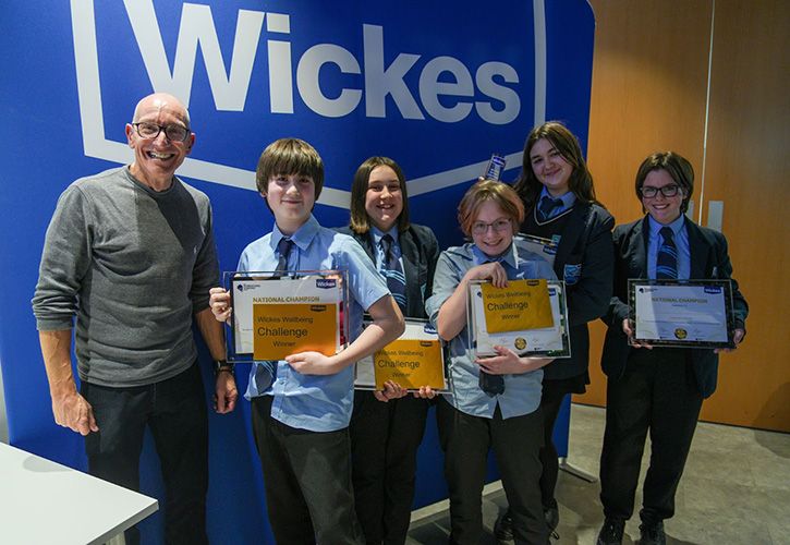 Wickes COO Fraser Longden, CMO Gary Kibble, CPO Sonia Astill with winners and runners up