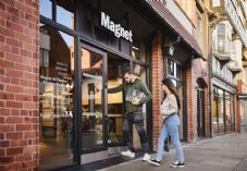 Magnet Kitchens Customer and tradesperson entering store