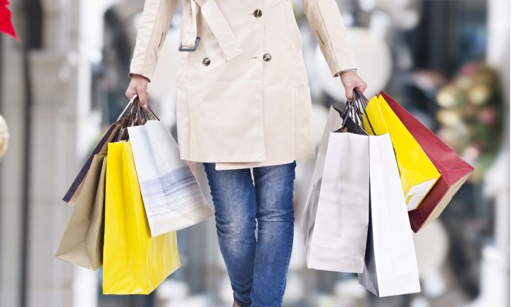 Female with shopping bags shutterstock_333722087 725 x 500