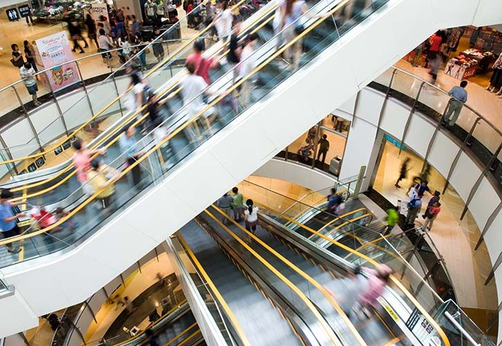 People escalator - shutterstock_107374190 725 x 500